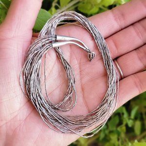 Vintage handmade liquid silver 10-strand heishi 925 sterling silver necklace